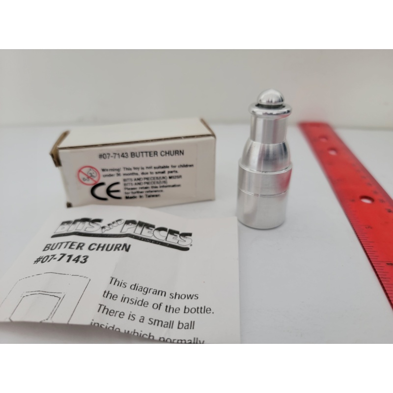 Butter Churn by Marcel Gillen with solution and original box.