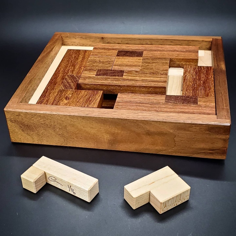 Hidden Pentominos by Tamás Vanyó and Eric Fuller