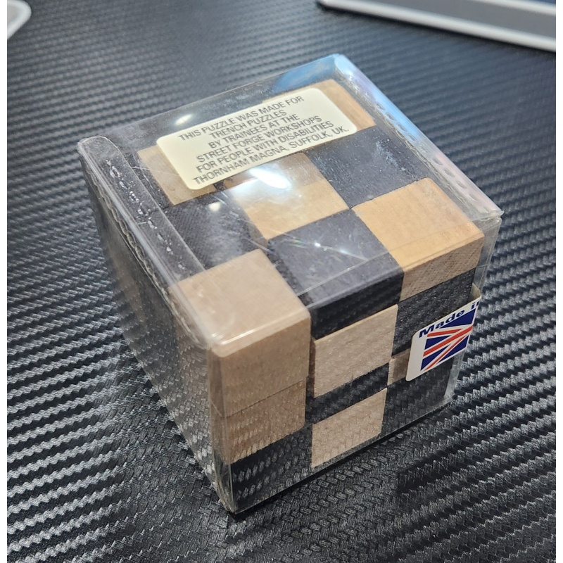 Cube Packing Puzzle made for Trench Puzzles by Street Forge Workshops