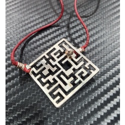 Silver puzzle ring and maze necklace by Yael Friedman