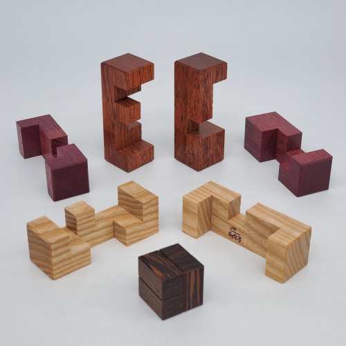 Parasitic Burr (mixed woods version) by Tyler Hudson and Eric Fuller