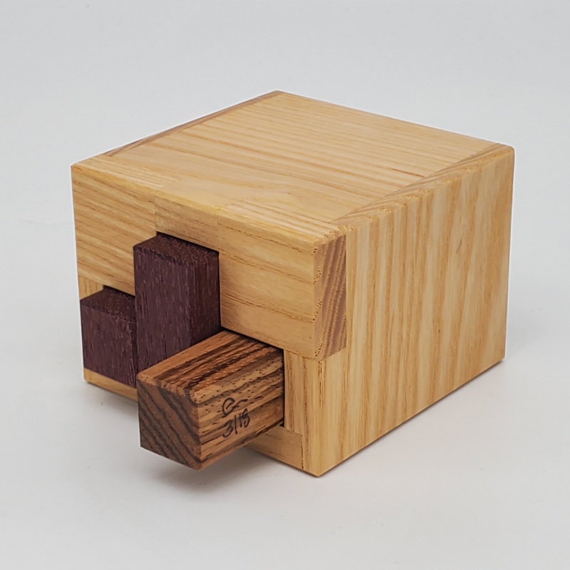 Box with Two Balls by Christoph Lohe and Eric Fuller