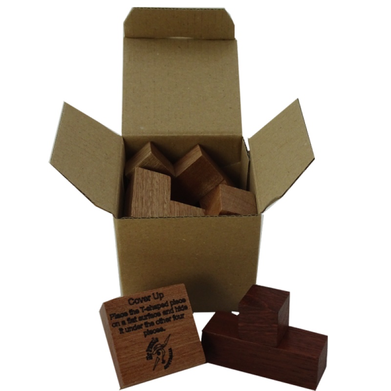 Cover Up unusual assembly puzzle by George Sicherman