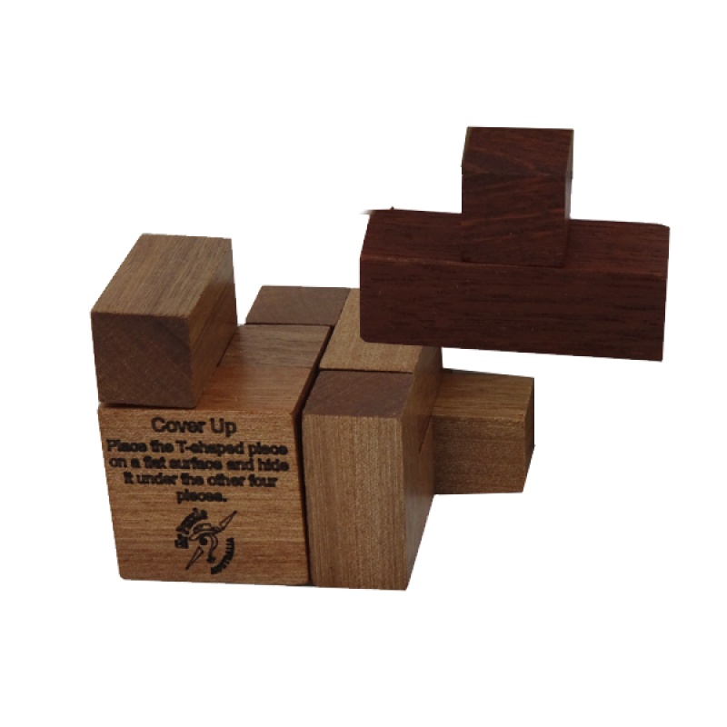 Cover Up unusual assembly puzzle by George Sicherman