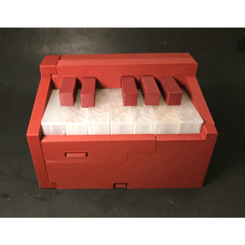 ONE-OF-A-KIND PIANO PUZZLE BOX  CARBON FIBER EDITION