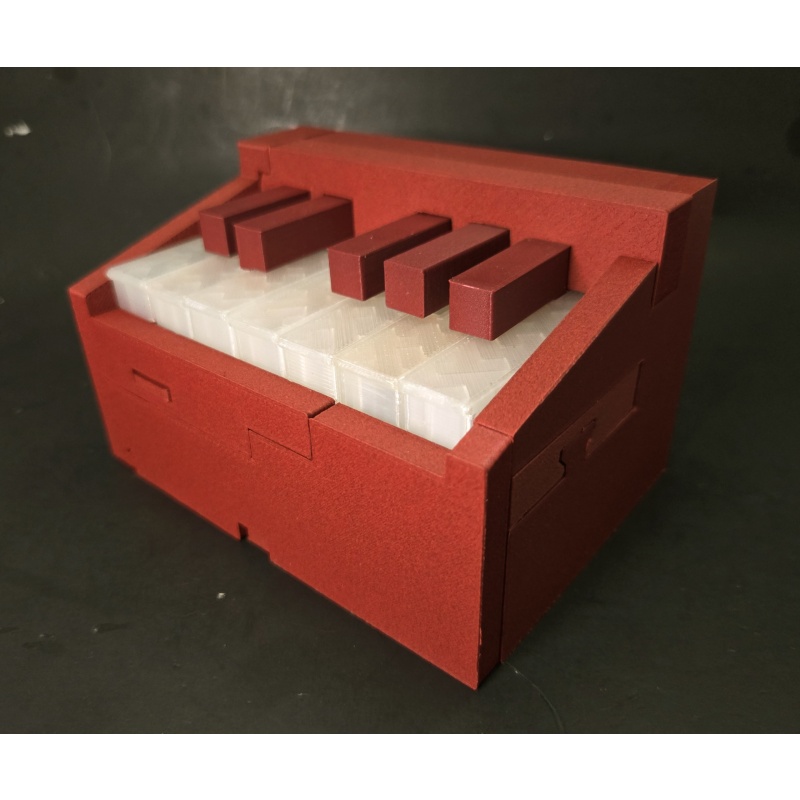 ONE-OF-A-KIND PIANO PUZZLE BOX  CARBON FIBER EDITION