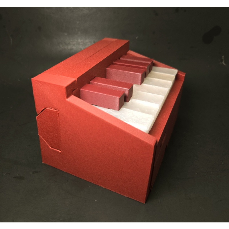 ONE-OF-A-KIND PIANO PUZZLE BOX  CARBON FIBER EDITION