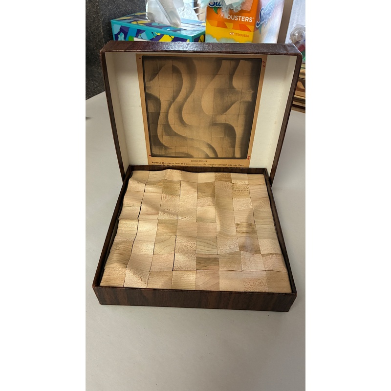 Contoura wood "jigsaw" by Baekgaard and Butler