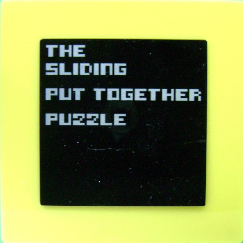 THE SLIDING PUT TOGETHER PUZZLE (c) Ton Delsing