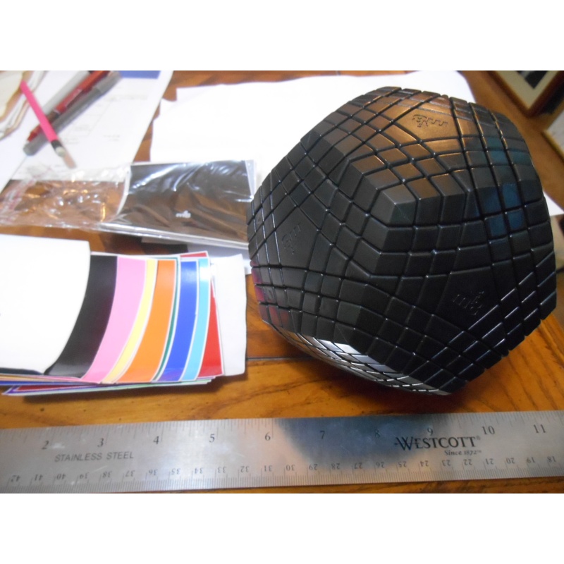 Teraminx, Meffert's black body with 2 sets of labels, from 2010