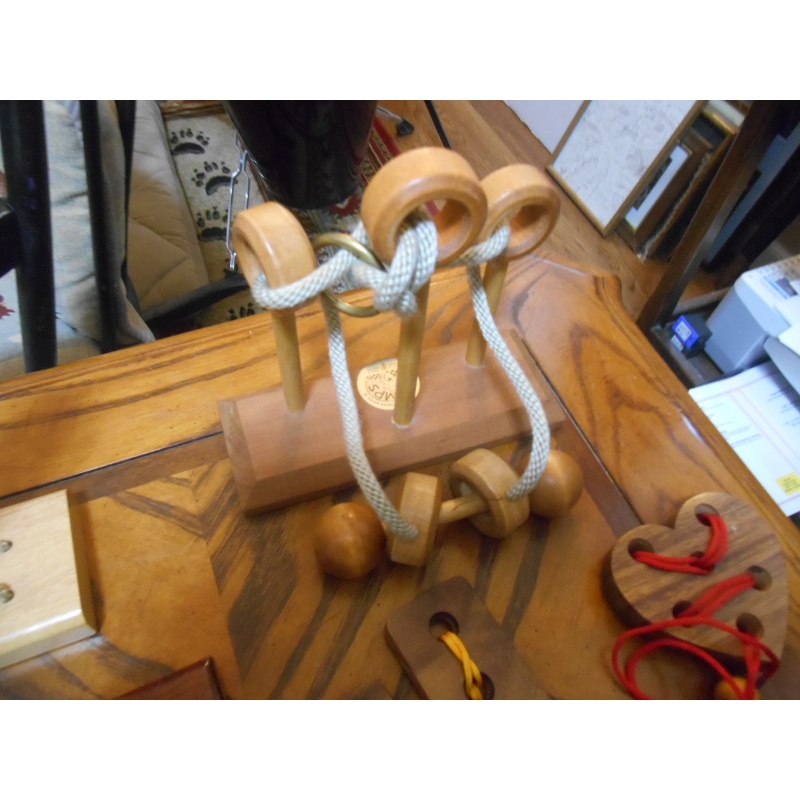 Seven wood+string disentanglements