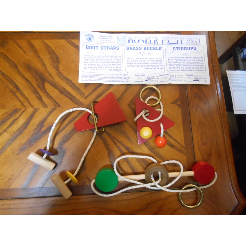 Three wood+string disentanglements, Pioneer Puzzle