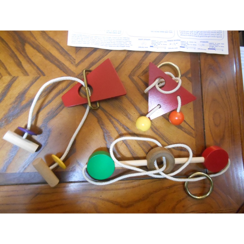 Three wood+string disentanglements, Pioneer Puzzle