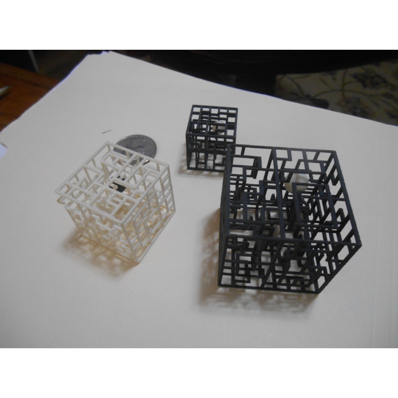 Three Steve Winter 3D wire-frame mazes