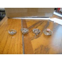 Four silver puzzle rings; 12, 8, 6, 3 bands