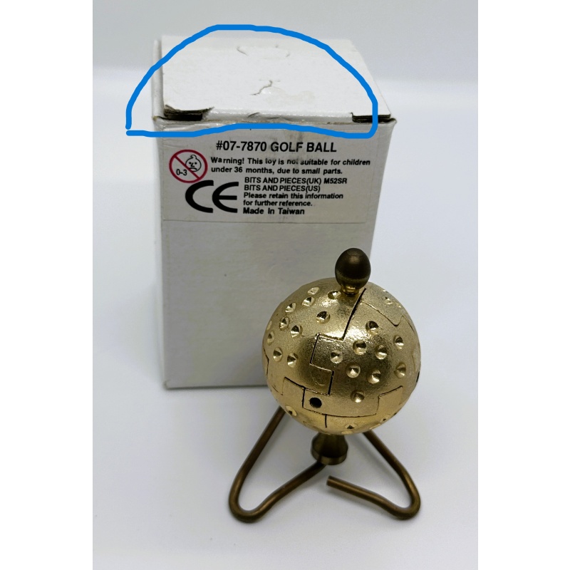 Golf Ball metal puzzle designed by Rocky made by Puzzle Makers