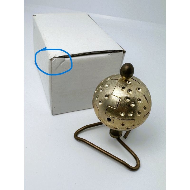 Golf Ball metal puzzle designed by Rocky made by Puzzle Makers
