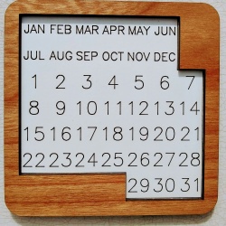 Puzzle Calendar - solve for each day of the year (walnut pieces and cherry border)