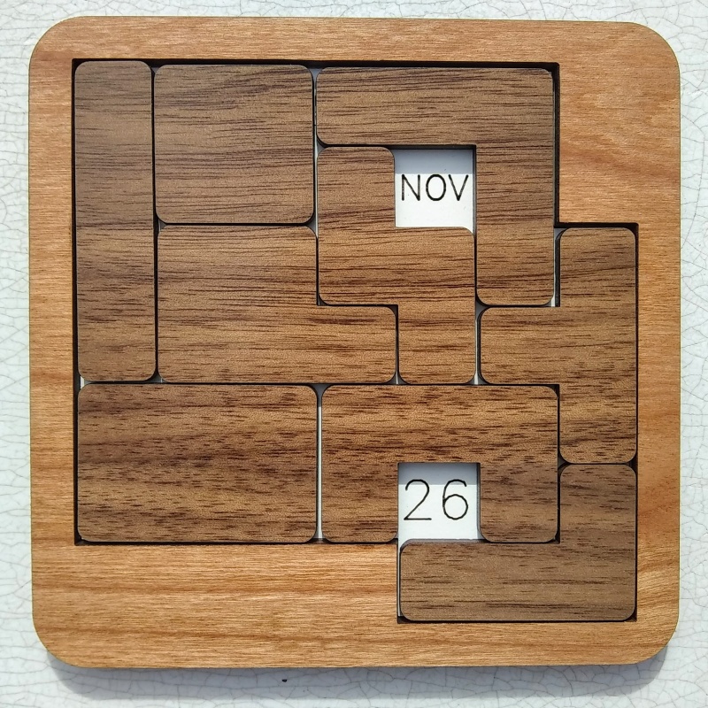 Puzzle Calendar - solve for each day of the year (walnut pieces and cherry border)