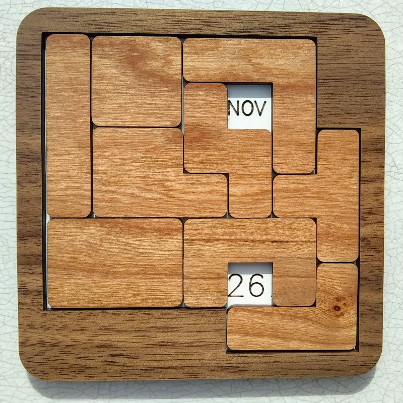 Puzzle Calendar solve for each day of the year (cherry pieces and