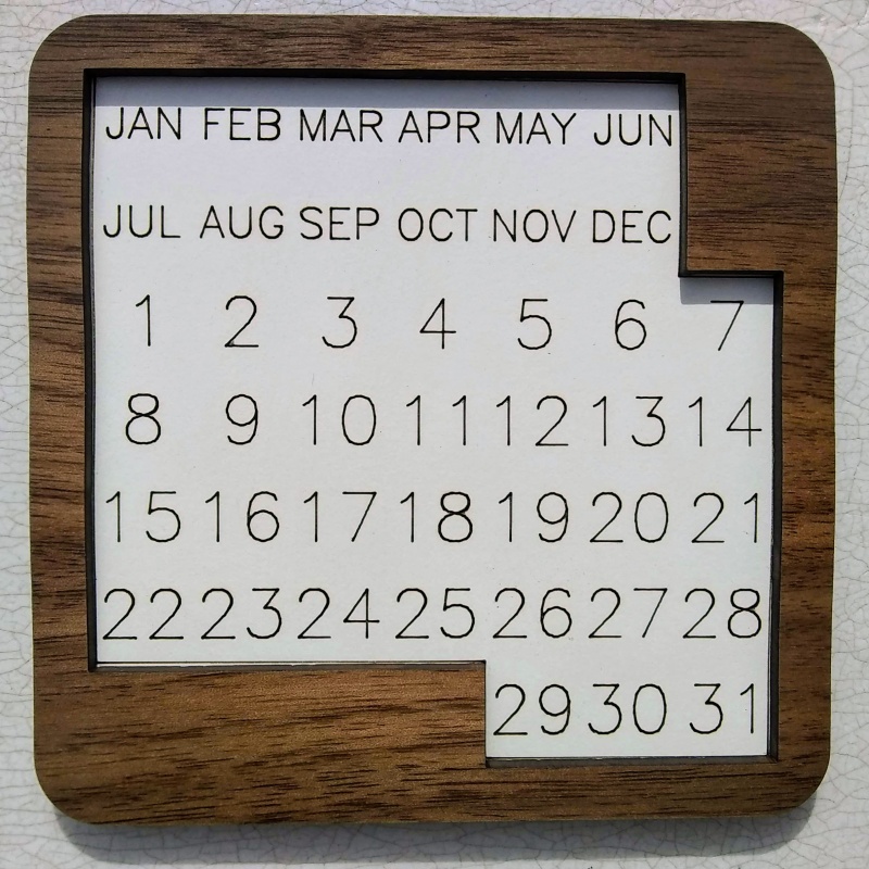 Puzzle Calendar - solve for each day of the year (walnut pieces and border)