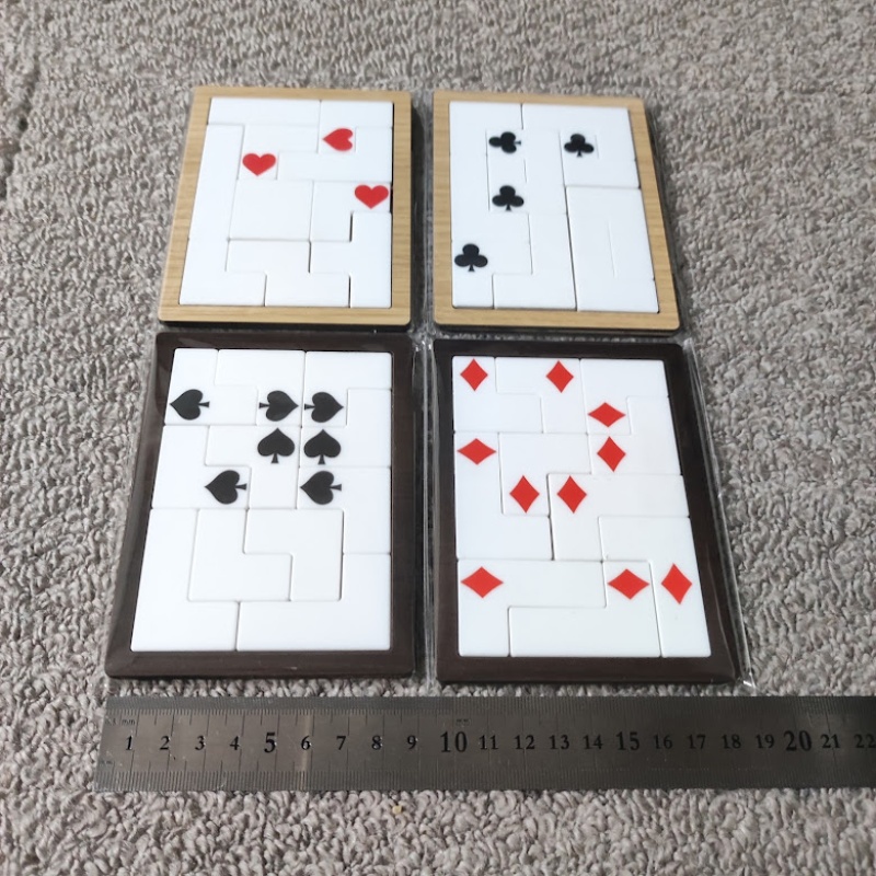 Set of 4 suits of cards puzzle by Lixy
