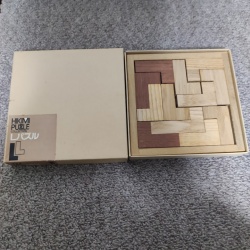 HIKIMI L Puzzle by Nob Yoshigahara One-sided packing puzzle