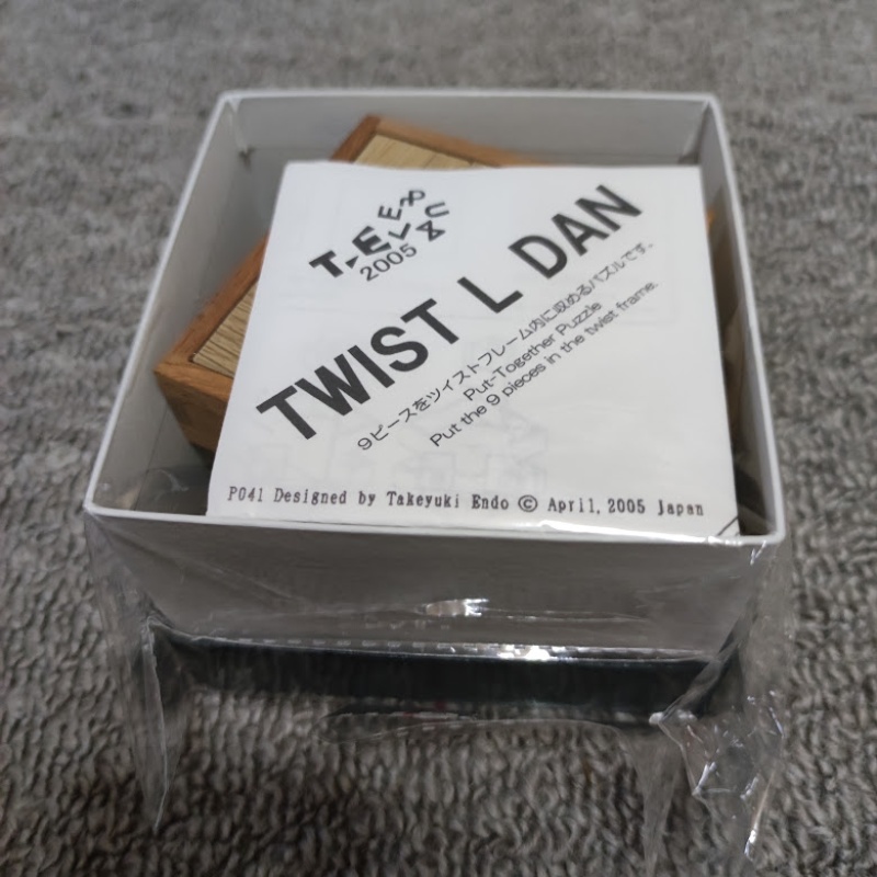 "Twist L Dan" Packing puzzle by Takeyuki Endo