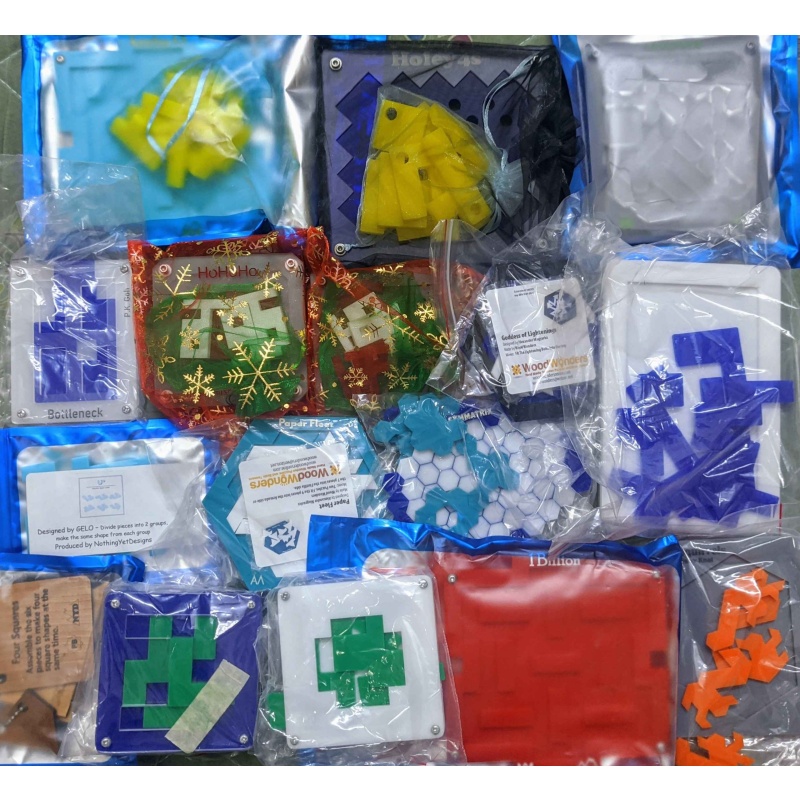 16 packing/symmetry puzzles lot