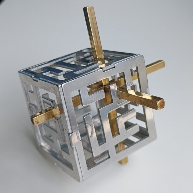 Oskar's Maze Cube (metal version) by Oskar van Deventer