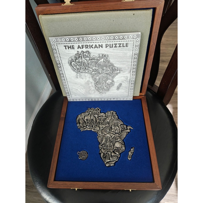 The African Puzzle - Paul Gibbs and Anthony Prischl