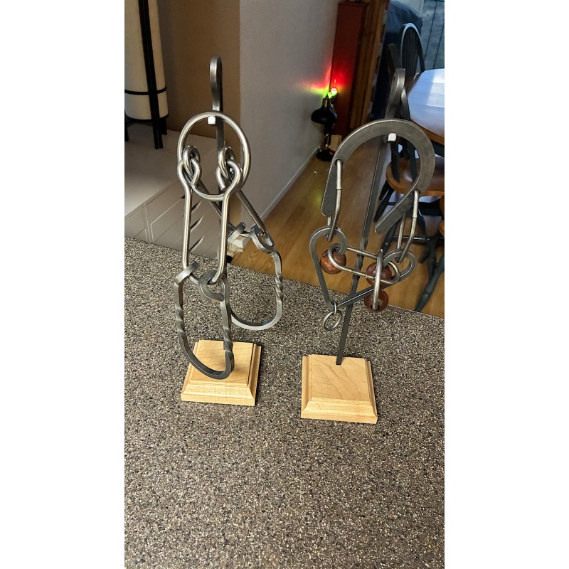 Two tavern puzzles with stands