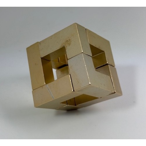 Iso Crate metal puzzle made by Bits and Pieces