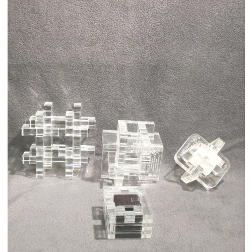 lot of four acrylic put together puzzles by Mr Puzzle!