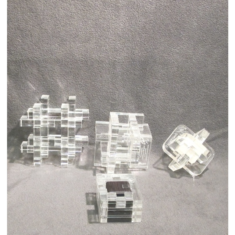 lot of four acrylic put together puzzles by Mr Puzzle!