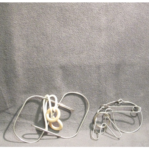 two challenging disentanglement puzzles