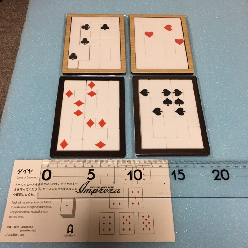 Set of 4 suits of cards puzzle by Lixy