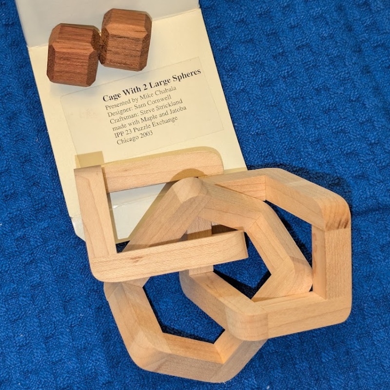 Cage with 2 Large Spheres (IPP23) by Sam Cornwell / Steve Strickland (Puzzlecraft)
