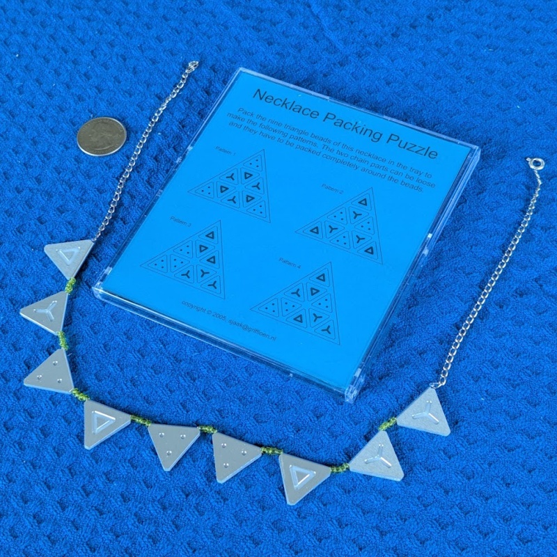 Necklace Packing Puzzle (IPP25) by Sjaak Griffioen / Griffioen Design