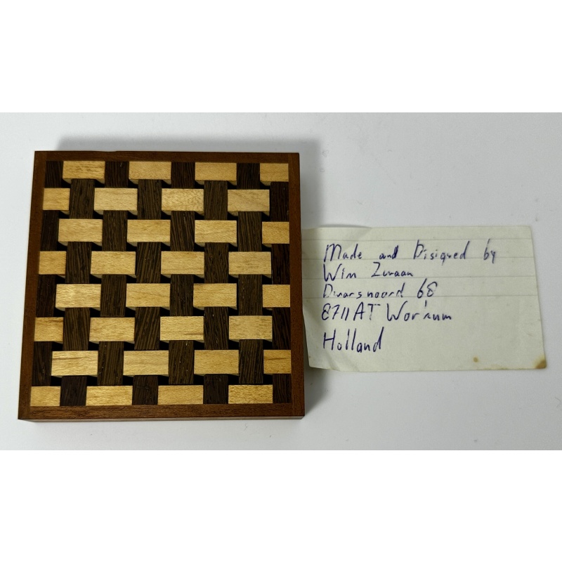 Wooden interwoven puzzle by Wim Zuraan