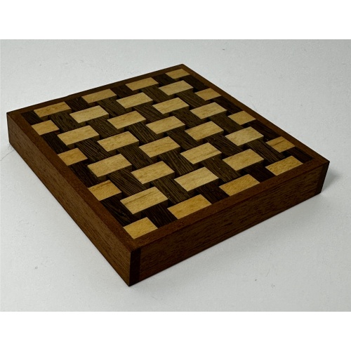 Wooden interwoven puzzle by Wim Zuraan